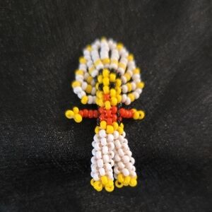 Vibrant Beaded Figure Accessory